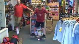 Sam masters the Onewheel Skateboard in the Cotswold outdoor shop at Grasmere